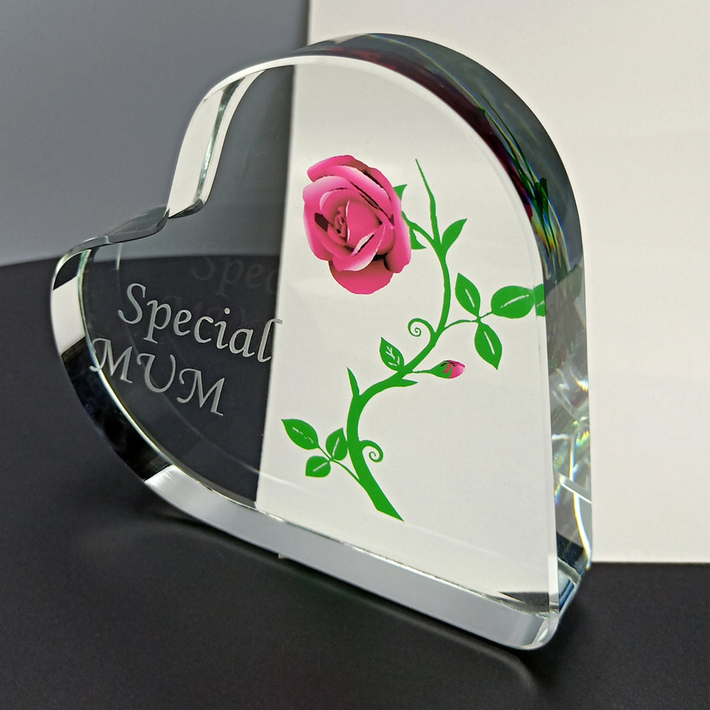 Heart-shaped glass ornament with a pink rose and green leaves, engraved with 'Special MUM'.