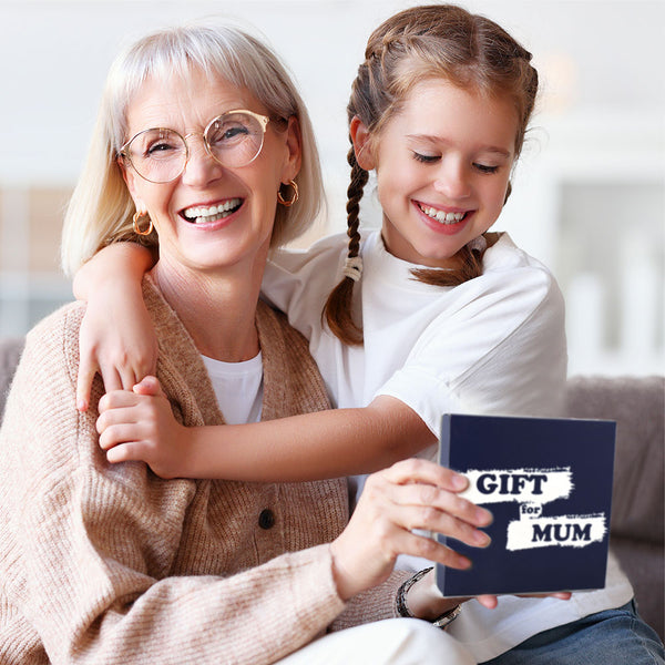 Happy grandma and grandchild with a gift