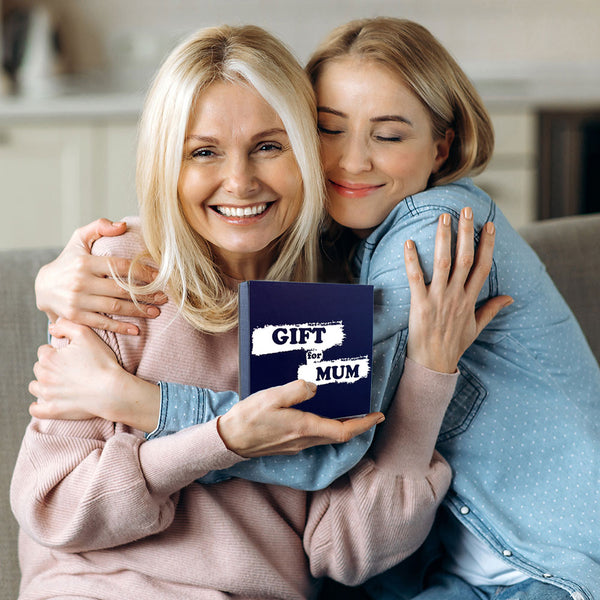 Mum and daughter happy together with a gift