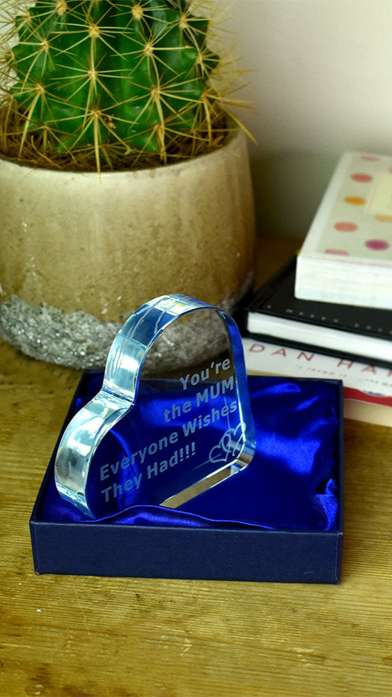 Engraved glass heart on a shelf