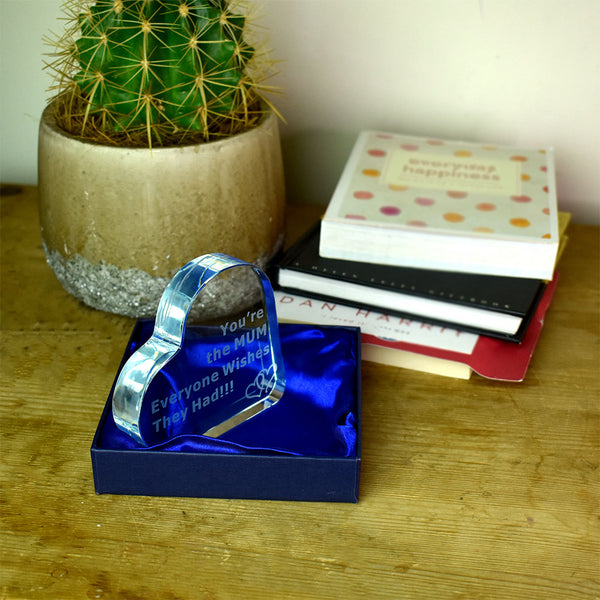 Engraved glass heart on a shelf